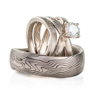 three piece mokume gane set, an engagement ring with a contoured thin band and a wider undulating band