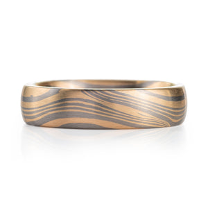 custom made mokume gane patterned ring made with palladium and yellow gold, pattern resembles flowing air or water