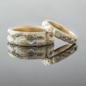 Mokume gane ring set Matching wedding bands his and hers couples wedding bands patterned Mokume Gane Ring Wedding Ring Set. Diamonds with yellow gold, palladium and silver