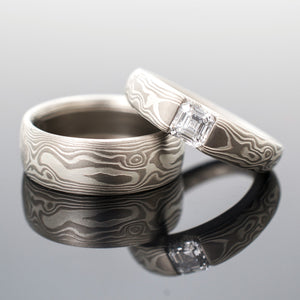mokume gane woodgrain pattern ring set, engagement style ring in a cathedral style with square diamond