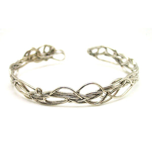 Inspired by New England vines and branches, this twist bracelet is a one of a kind statement.  Organic and ephemeral. Pictured in sterling silver. Also available in vermeil or oxidized silver.