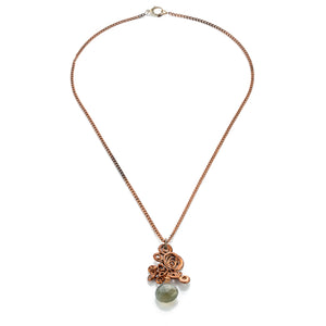 rose gold with green gem stone necklace. swirl