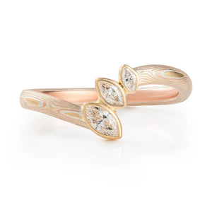 Mokume Gane ring, curved band with three delicate marquise cut diamonds, gives the feeling of leaves on a branch