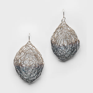 Pair of teardrop shaped wire mesh earrings on a white background. Color shifts from lighter silver color at the top of the earrings, down to dark gray at the bottom.