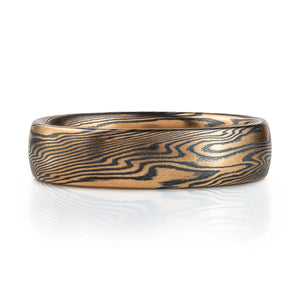 Mokume gane ring mens wedding band High contrast mokume gane mens wedding band ring. Unisex. Gold and blackened oxidized black sterling silver unique nature inspired woodgrain patterned two toned tone yellow white gold alternative metal