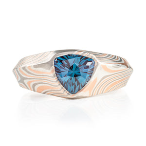 custom made mokume gane ring, wide tapered ring with a beveled edge and large triangular blue stone