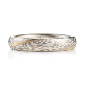 mokume gane twist pattern ring with yellow gold stratum layer