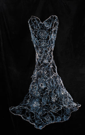 Dress sculpture made of hand woven wire, in silver and blue. Sweetheart neckline, strapless style, with a flared skirt.