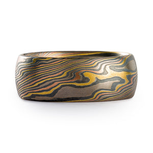 Mokume gane band made by Arn Krebs, 18kt Firestorm Palette (yellow gold, red gold, palladium and silver), low dome profile, 8mm wide, and Twist pattern