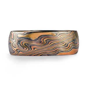 mokume gane large band with multiple golds and metals in twist pattern