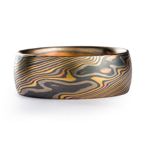 Mokume Gane Twist pattern ring made by arn krebs , contains layers of metal in gray dark gray yellow and red colors, very large actual size is 15 and width is 10mm