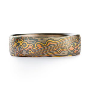 This beautiful Mokume Gane ring is shown in a combination of two of our other patterns, Twist and Droplet, and our Firestorm metal combination. The ring has a low-dome profile and an etched and oxidized finish