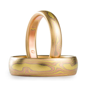 Mokume Gane ring set, two rings made in woodgrain pattern and all gold palette, yellow gold is 18k