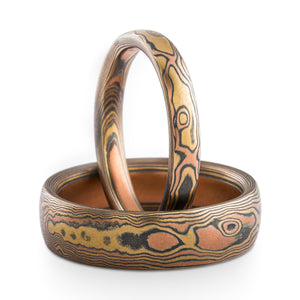 mokume gane wedding ring set in woodgrain pattern