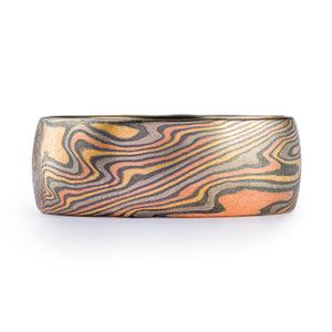 wide and bold mokume gane wedding band in Firestorm palette ( red gold, yellow gold, palladium and oxidized silver)