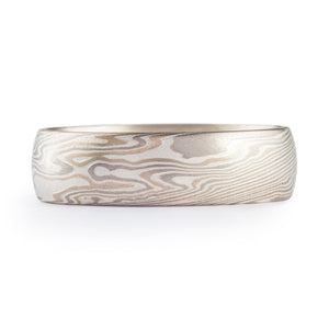 classic subtle feeling mokume gane ring in twist pattern and light metals palette, white gold palladium and silver