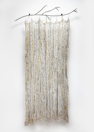 Long woven wire metal metallic hanging tapestry. Movement Rain inspired clear raining rain dripping art. Tree branch botanical accents.  Gold champagne and silver metal accents with hanging glass bead strands strings of beads and glass gemstones black beads and clear briolettes dangling hanging on edge of art movement like rain. Woven metal tapestry strung on a steel metal bar wall mountable.
