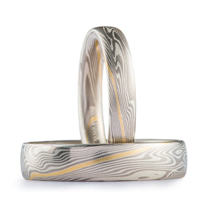 yellow gold mokume ring set with a layer running through it