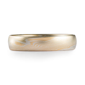 very subtle feeling yellow gold and silver mokume gane ring, soft and delicate feeling wedding band