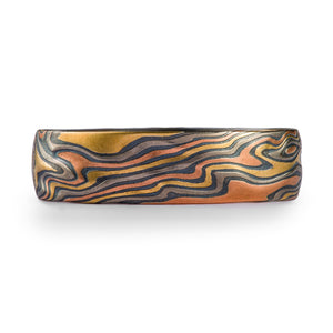 very graphic feeling mokume gane patterned ring with high contrast layers