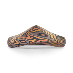 unique special shaped mokume gane band in twist pattern, the ring has a unique crown like shape 