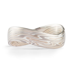 unique mokume gane ring undulated to create a waving style shape for a modern and special feeling wedding ring