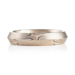 modern feeling beveled edge mokume gane ring in twist/star pattern with red gold palladium and silver