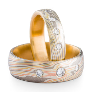 Mokume Gane rings or wedding band set arn krebs, flush set repurposed diamonds, flare palette firestorm palette and twist pattern, yellow gold red gold palladium and silver