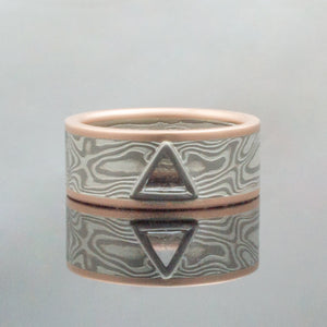 Mokume Gane Ring mens Wedding Band triangle stone Woodgrain Pattern and Ash Palette w/ Macle Stone triangle shaped stone triangular tri stone Mokume Gane Ring mens Wedding Band matching wedding bands custom bespoke red gold yellow gold rose gold woodgrain Pattern black blackened oxidized silver palladium alternative metal nature inspired rustic artisan topographical earthy style unique handmade matching wedding bands mens womens custom wedding bands artistic different alternative mens wedding band ring