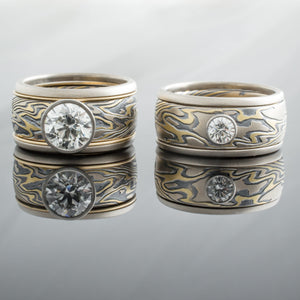 Ring set Mokume Gane Wedding Bands unique diamonds gold with loose rails and and diamonds.