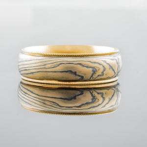 Mokume gane ring mens band with gold rails. Custom and bespoke 14K yellow gold palladium patterned artisan handmade fine jewelry topographical nature inspired mixed metal earthy organic style