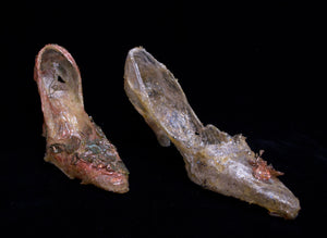 Mixed media shoe sculptures made of resin waxy glossy and opalescent with metallic botanical accents. pointed toes and low heels, home decor, art collection